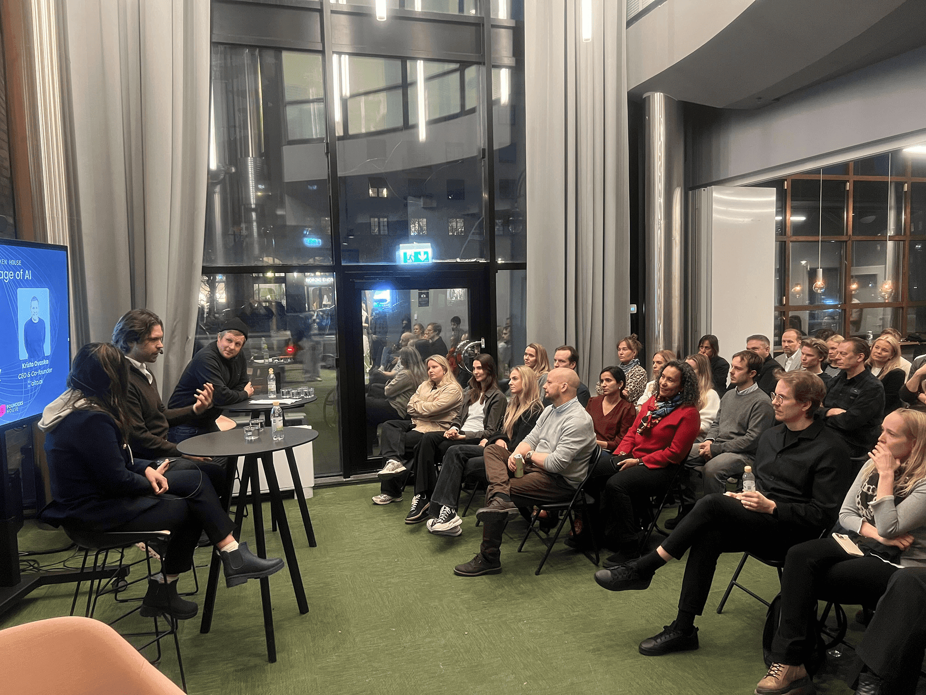 The speakers on stage and the audience